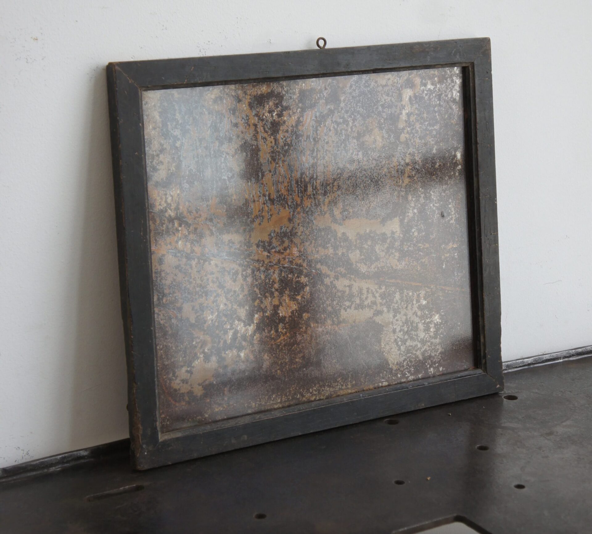 Frame with rusty iron plate